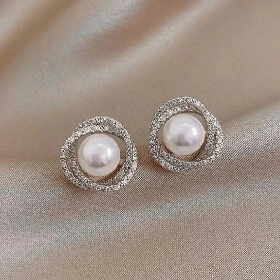 Eleganta glittrande spiralörhängen med pärlor