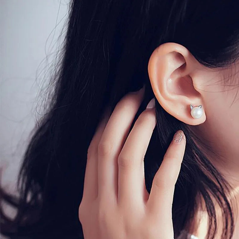 Örhängen i sterlingsilver med kattögepärla