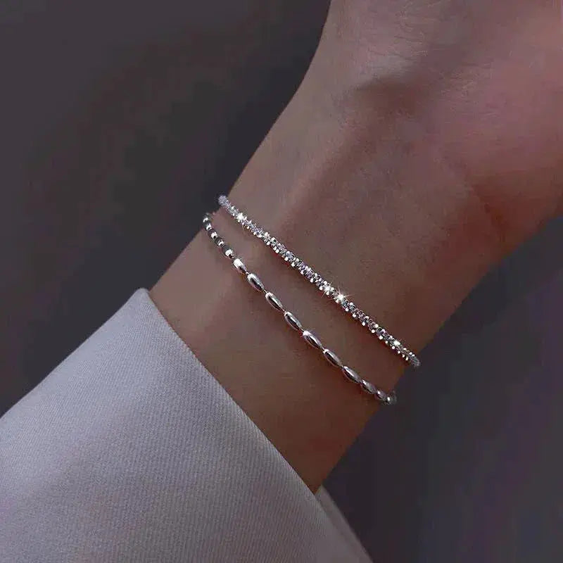 Set med silverarmband med zirkon