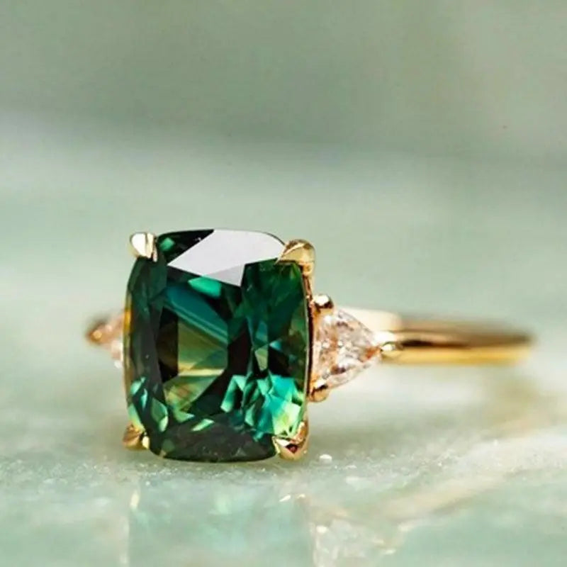 Elegant fyrkantig ring med smaragd