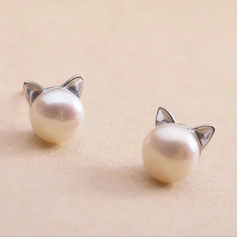Örhängen i sterlingsilver med kattögepärla