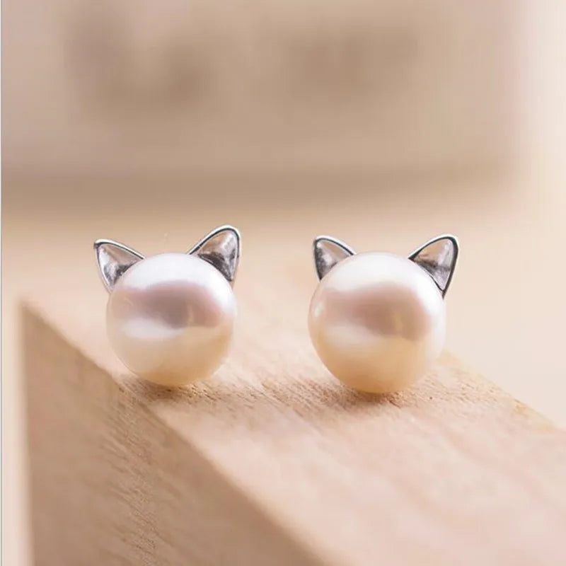 Örhängen i sterlingsilver med kattögepärla